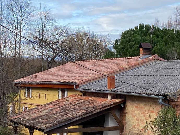 Rénovation complète d'une couverture avec tuiles en terre cuite